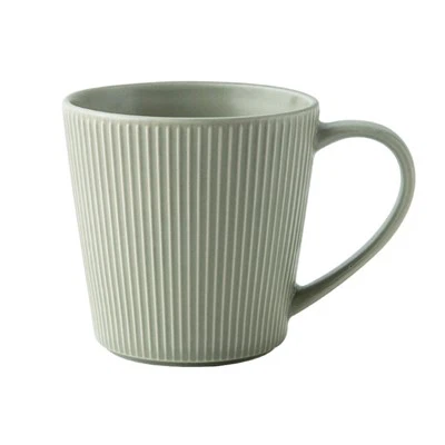 In reliëf gemaakte koffiemok